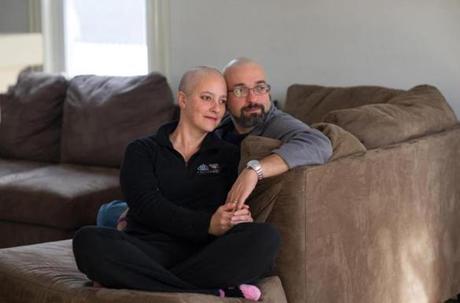  Drs. Amy Reed and Hooman Noorchashm, at their Needham home in 2014, worked to curtail the medical procedure that caused her cancer to spread.
